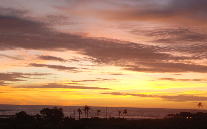 Sunset over the ocean at Canggu beach, Bali