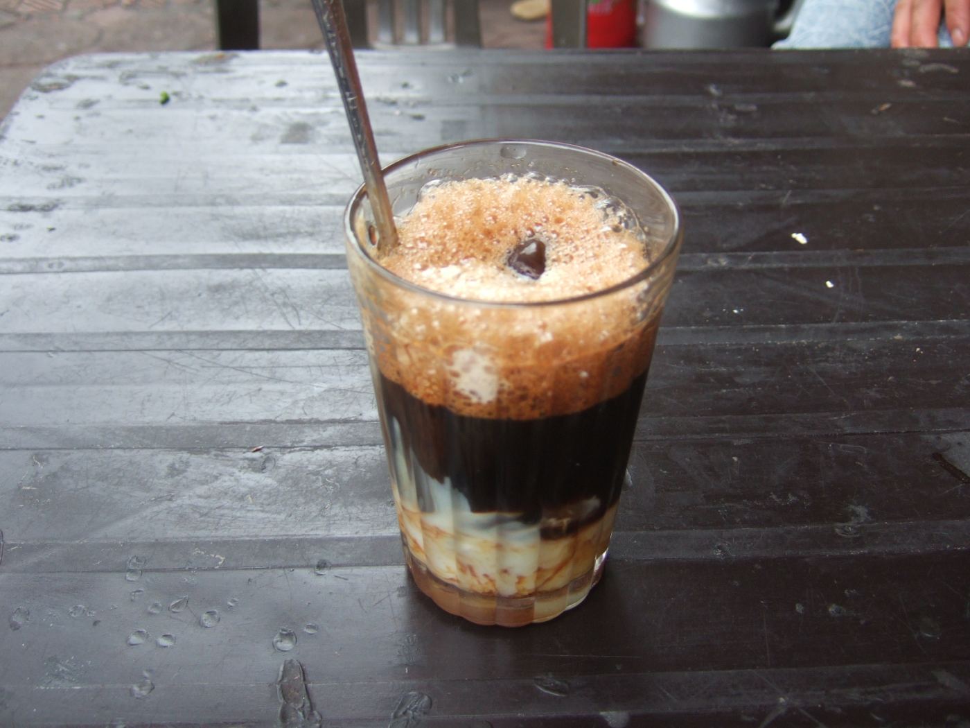 A glass of Vietnamese iced coffee, cà phê sữa đá