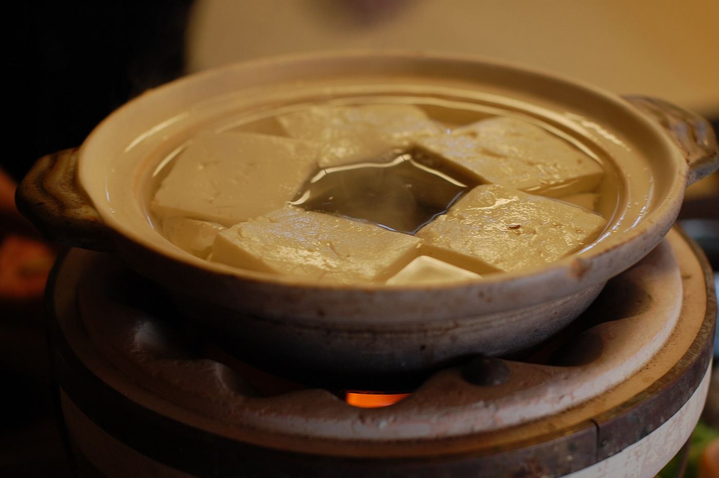 A pot of yudofu tofu hot pot simmering with kombu broth