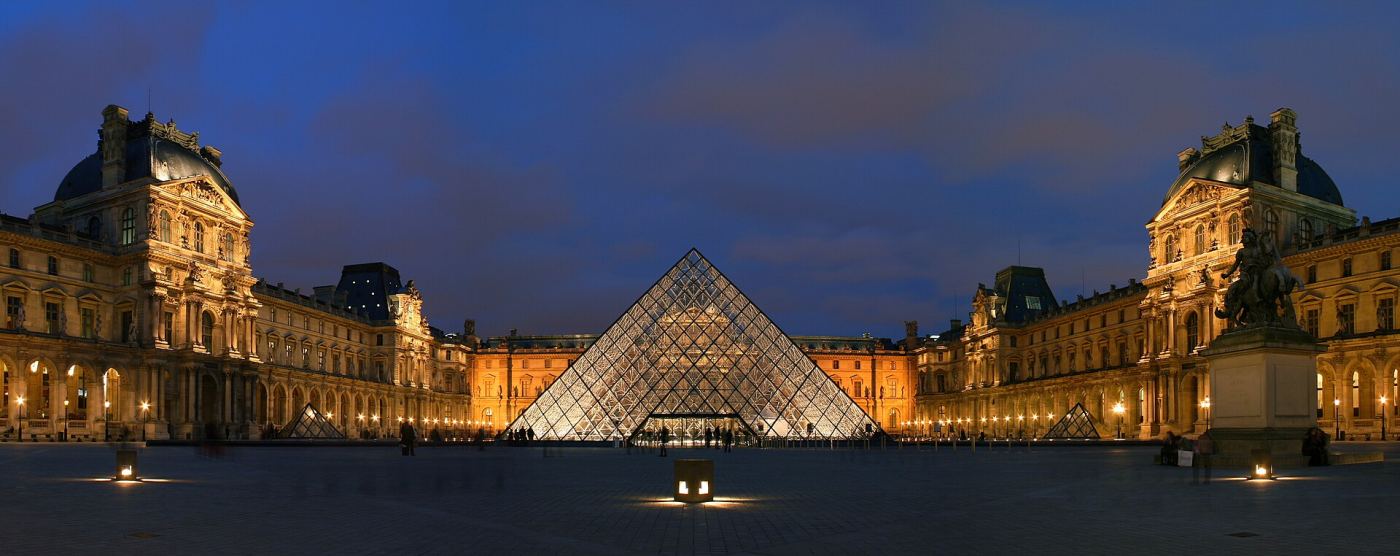The Louvre Pyramid illuminated at night