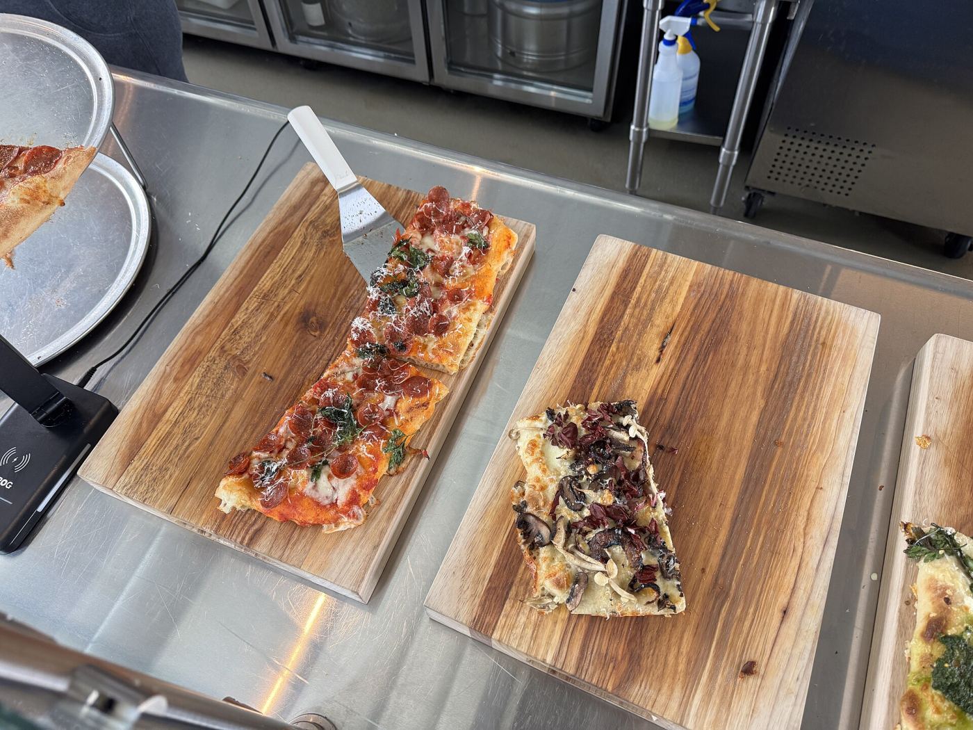 Rectangular trays of Roman-style pizza al taglio