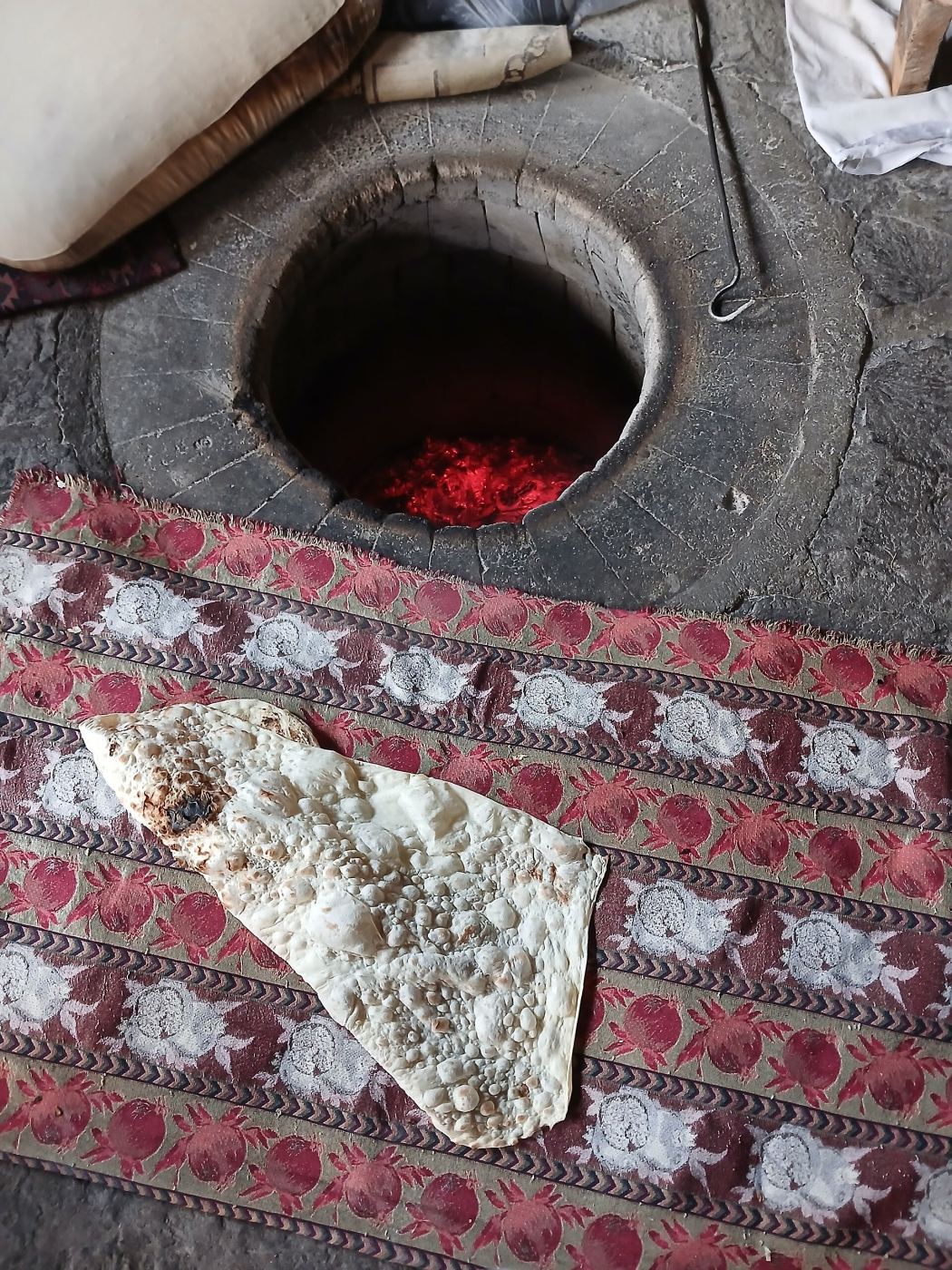 Lavash bread baked in a traditional tonir oven
