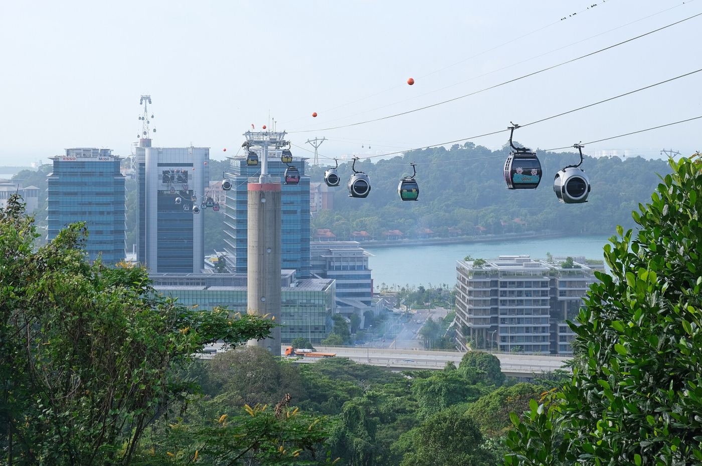 Cable cars traveling from Mount Faber toward Sentosa Island, Singapore