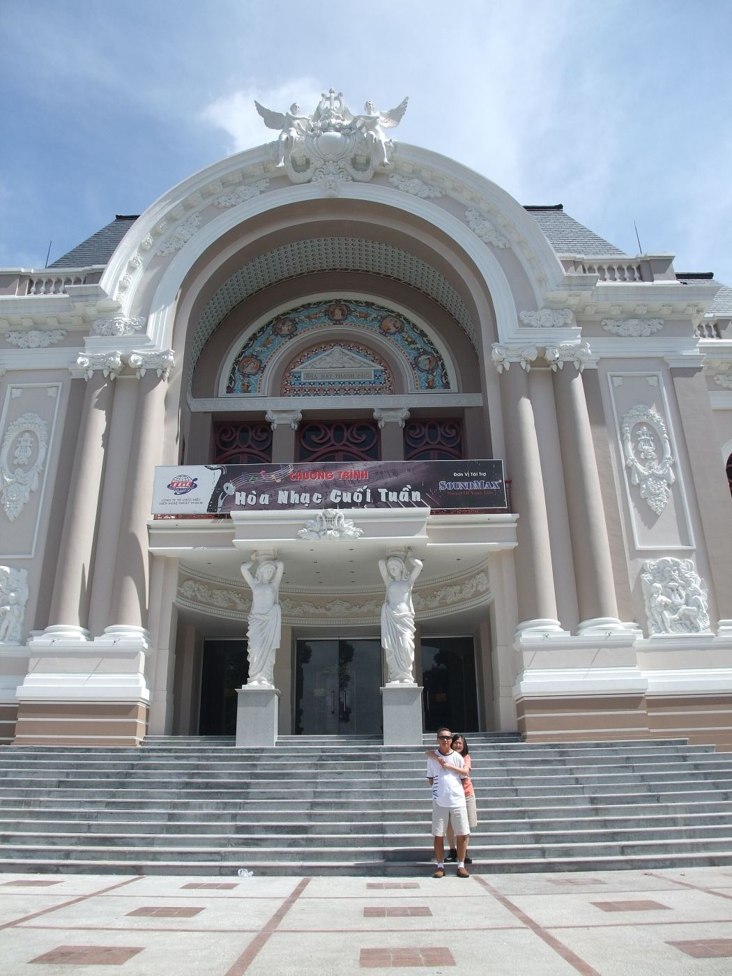 The ornate French colonial facade of the Saigon Opera House in Ho Chi Minh City