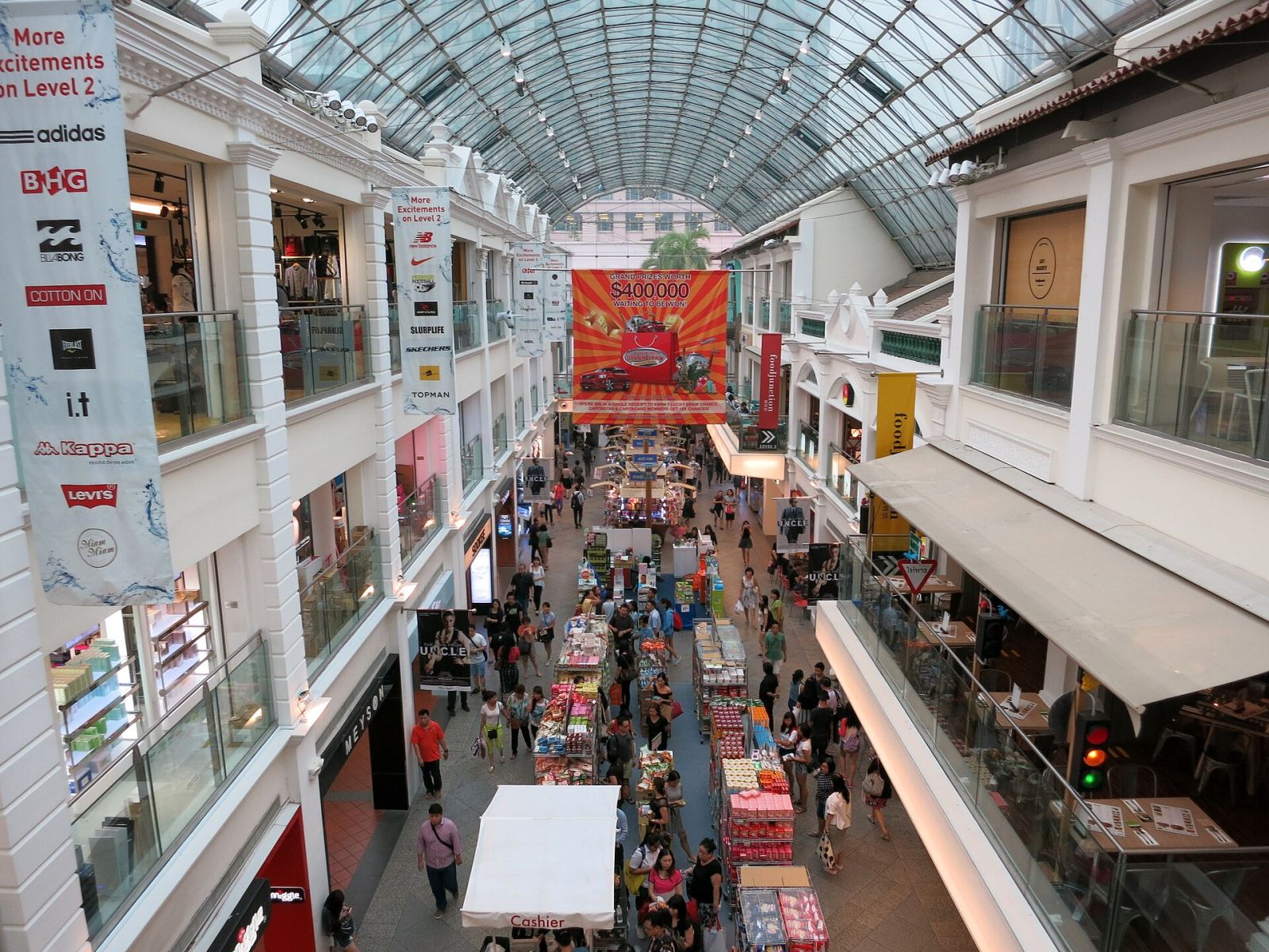 Interior of Bugis Junction mall showing the covered street and multiple retail floors