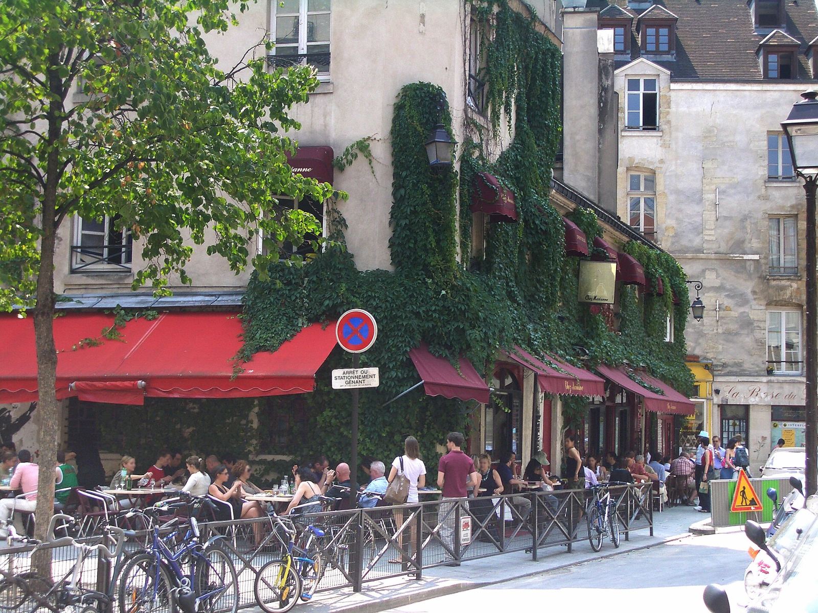 Ivy-covered café terrace in Le Marais, Paris