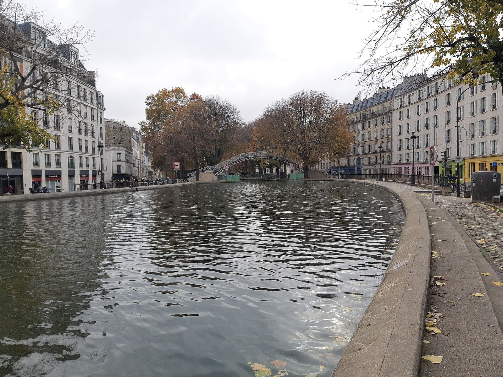 Cast-iron footbridge over Canal Saint-Martin in Paris in autumn