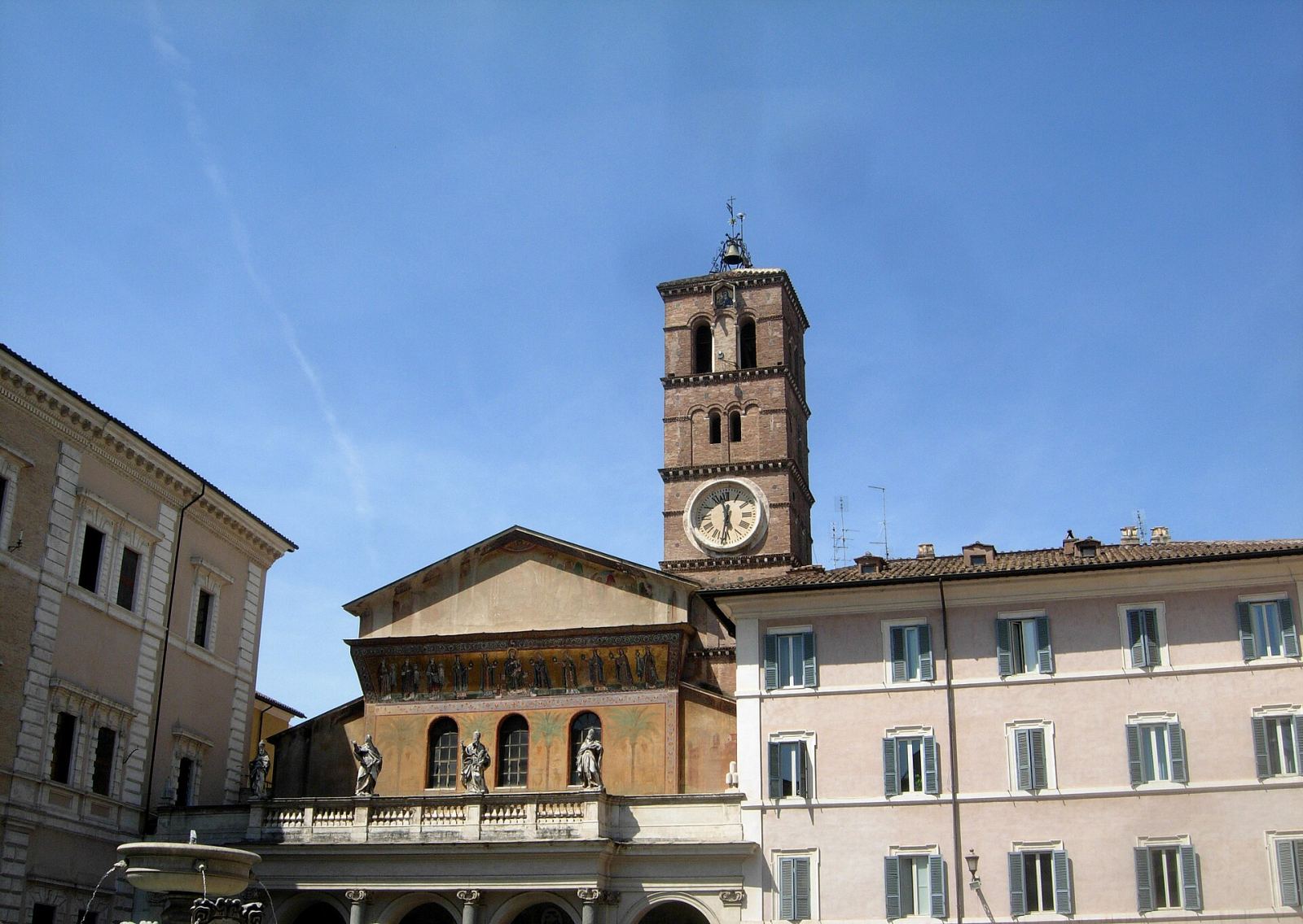 Santa Maria in Trastevere basilica facade and bell tower in Rome