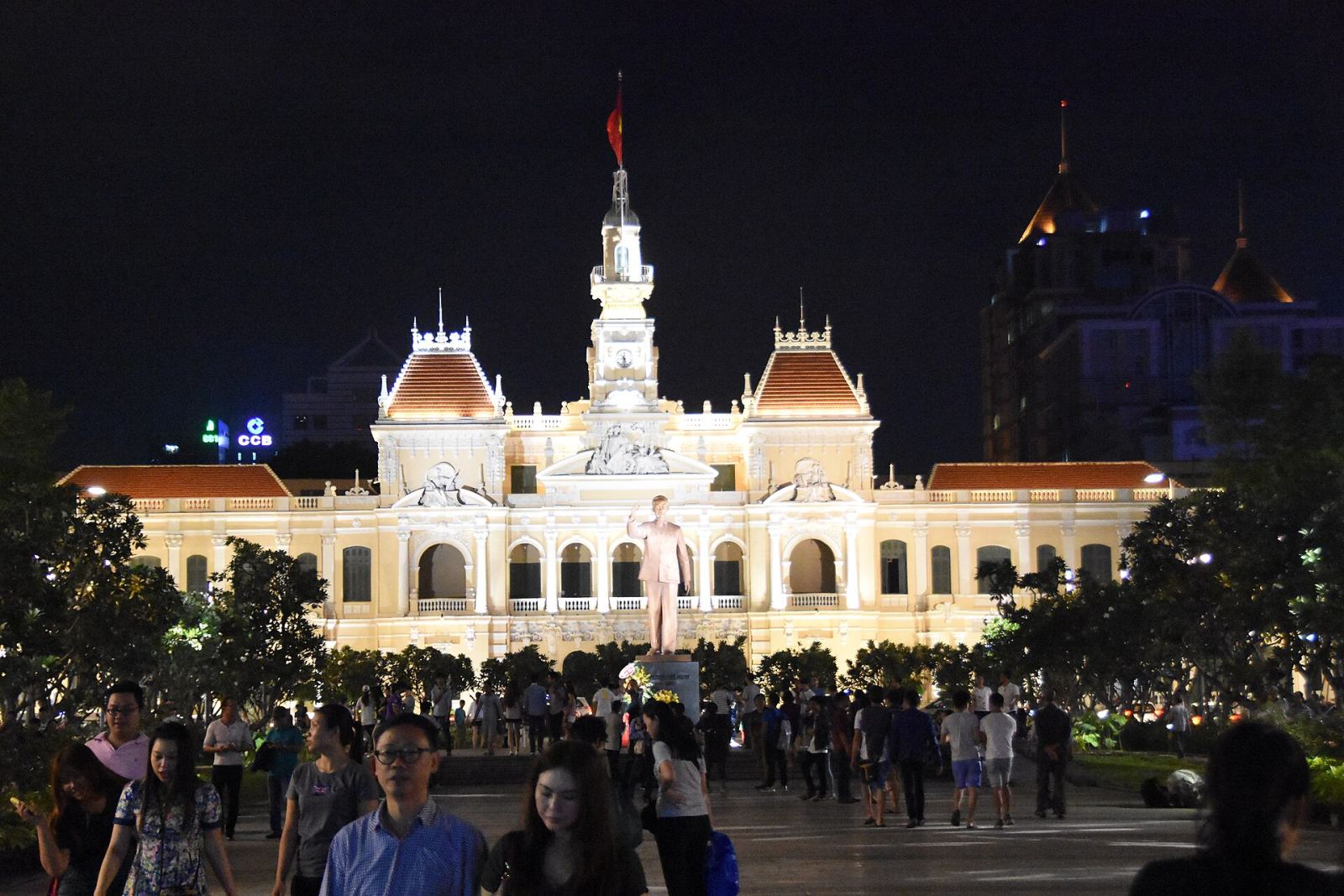 Saigon City Hall illuminated at night at the end of Nguyen Hue Walking Street