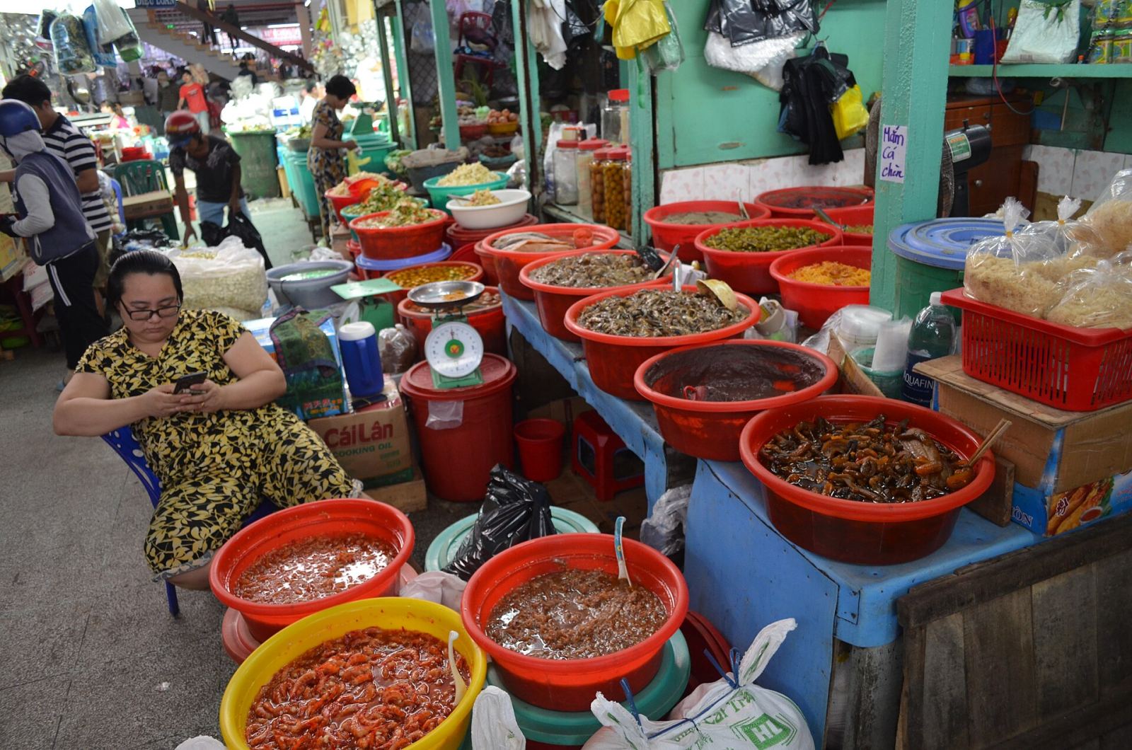 Spice and preserved food stalls inside Binh Tay Market, Cho Lon