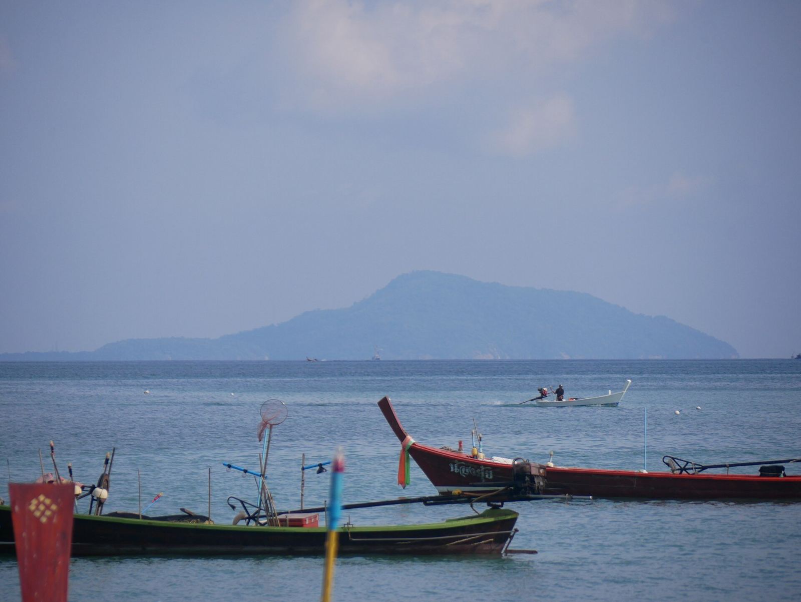 Fishing boats and island view from Rawai Beach, Phuket