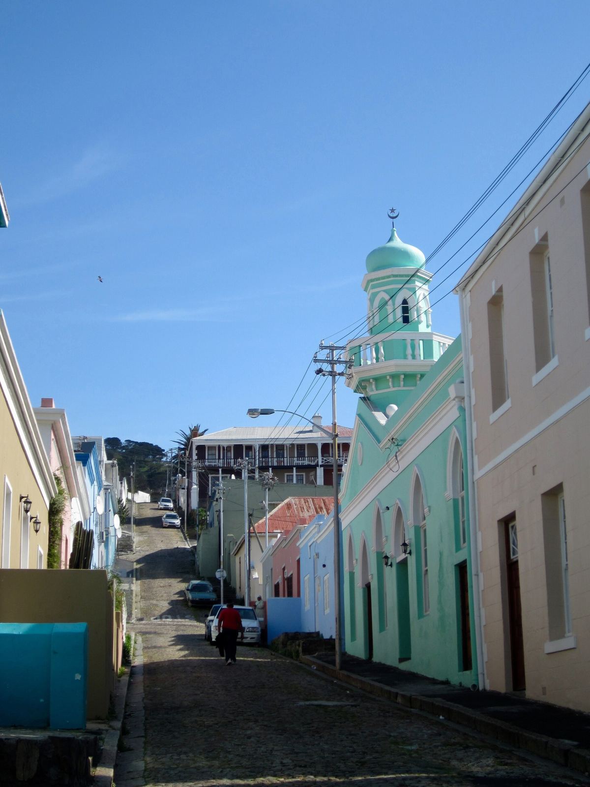 Green-domed mosque minaret among houses in Bo-Kaap, Cape Town
