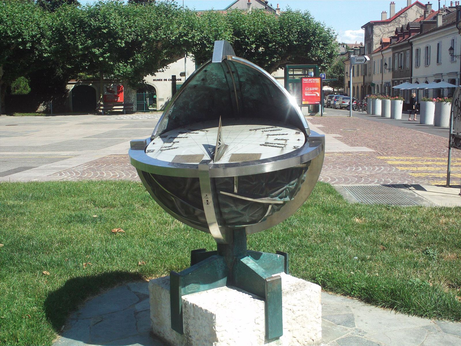 Sundial sculpture on a street in Carouge, Geneva